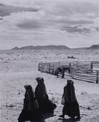 Women returning from a trip to the trading post